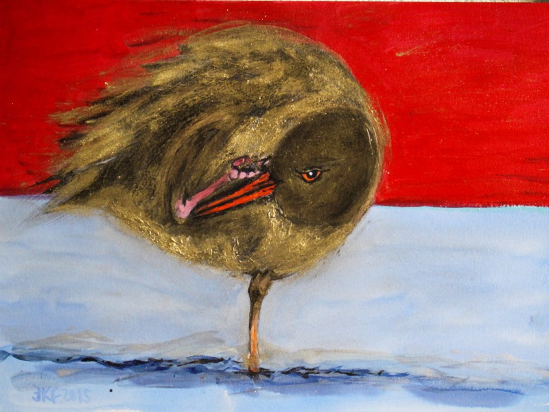 Goldvogel auf einem Bein